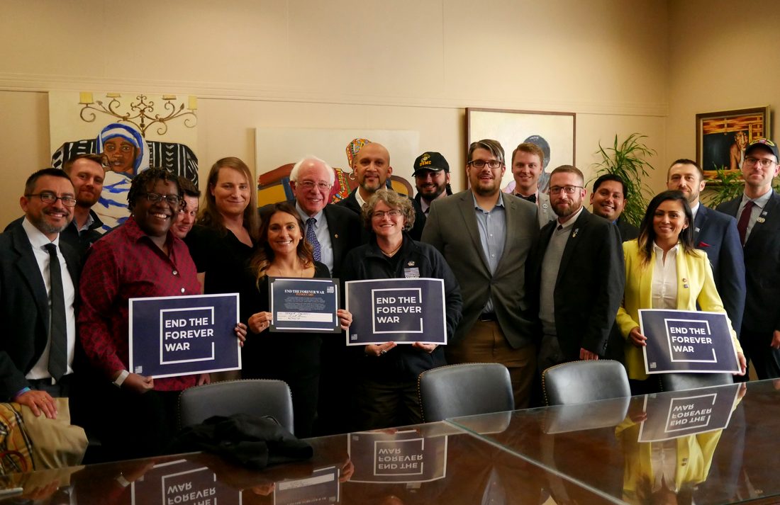 Senator Bernie Sanders signing the End the Forever War pledge